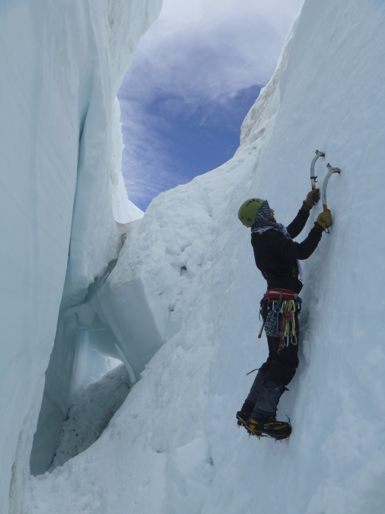 Ice climbing practice inside a large crevasse